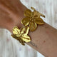 Bracelet large à motif floral et design géométrique ouvert, réglable et tendance (nouveauté 2025) – Vente en gros, idéal pour les fêtes ou comme cadeau. - A.F.V. Sud